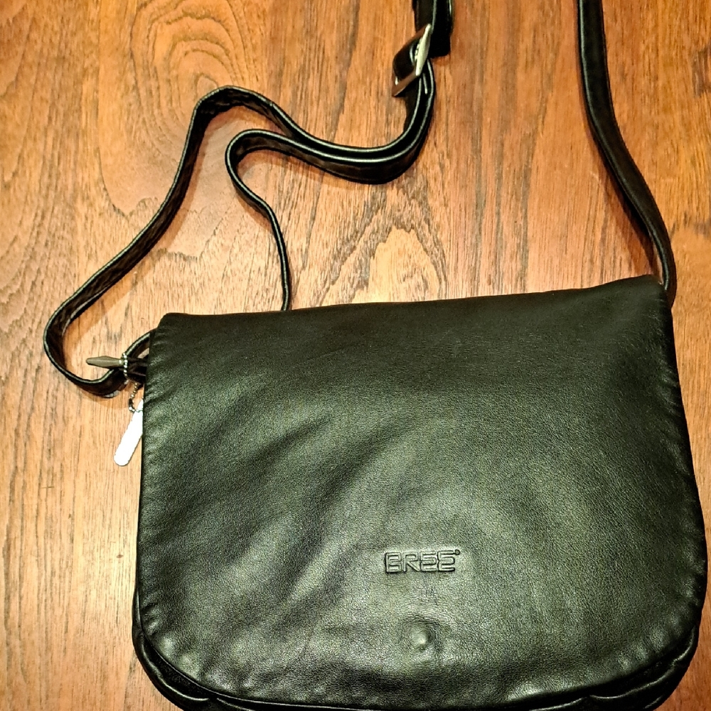 Black Crossbody Bag with Adjustable Strap and Minimalist Design